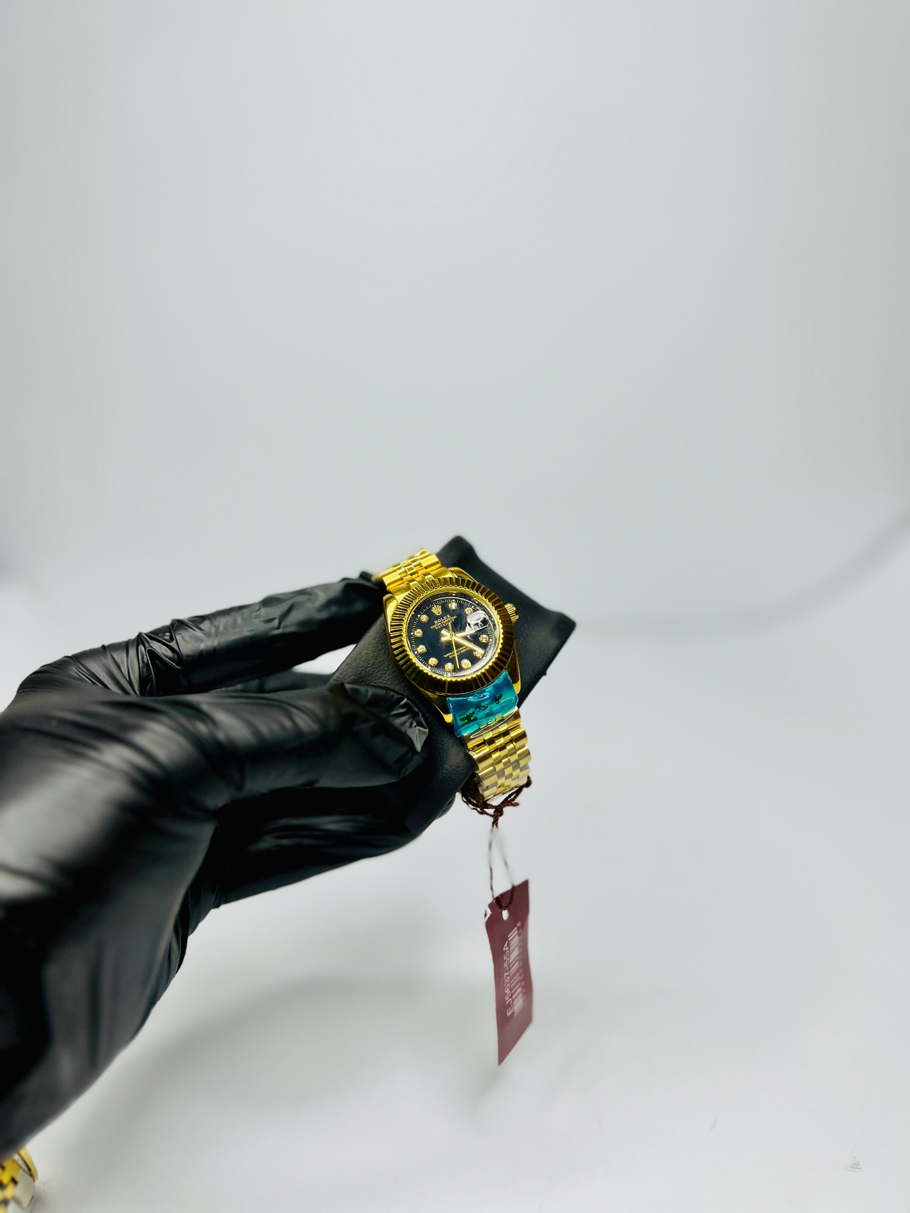 Rolex Oyster Perpetual Gold Tone With Black Dial