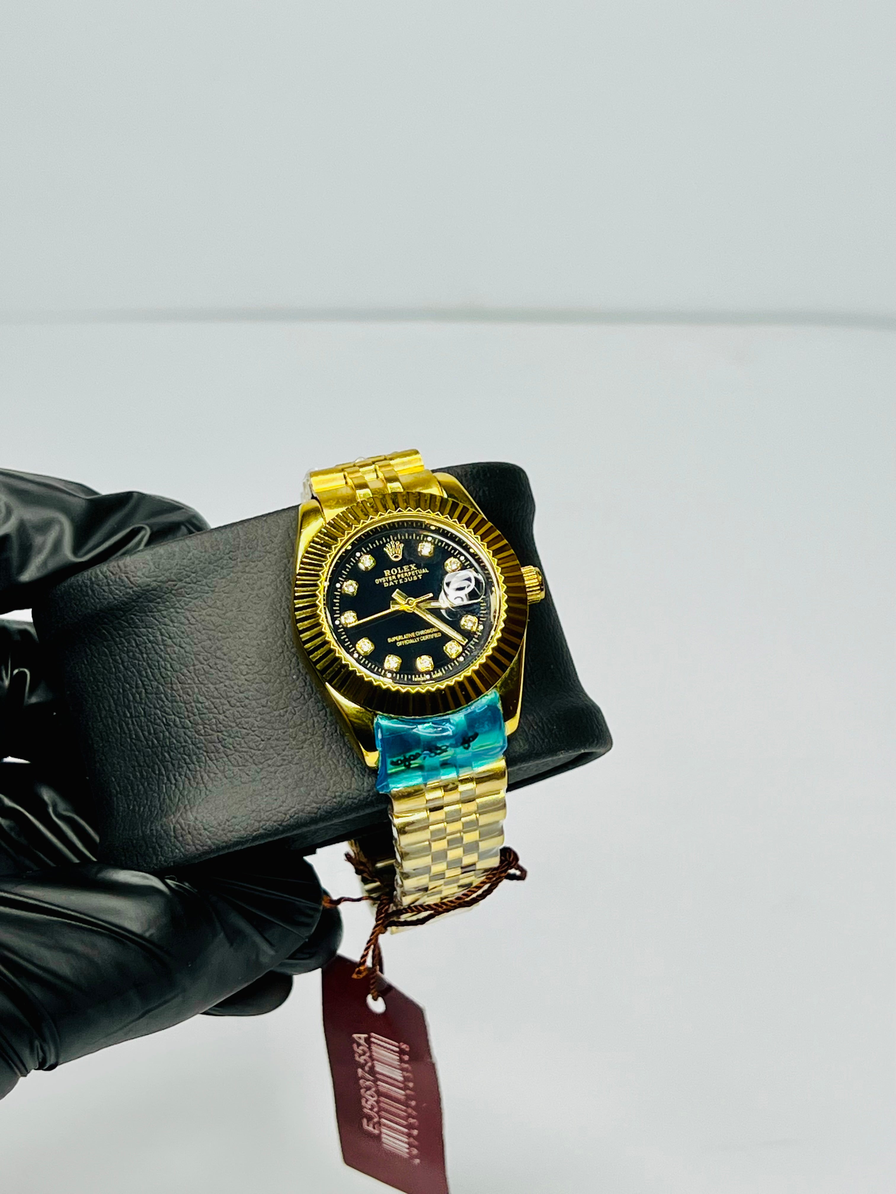 Rolex Oyster Perpetual Gold Tone With Black Dial